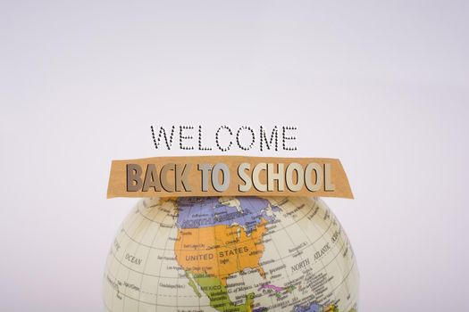 Globe and back to school title