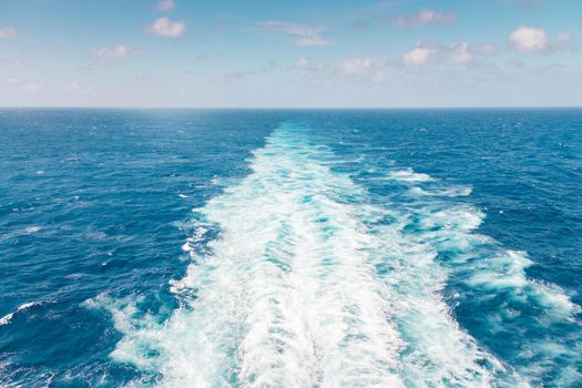 Cruise ship wake or trail on ocean surface