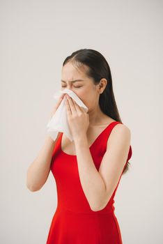Young Asian woman got sick and flu on white background