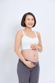 Pregnant women are watching the stomach grow happily.
