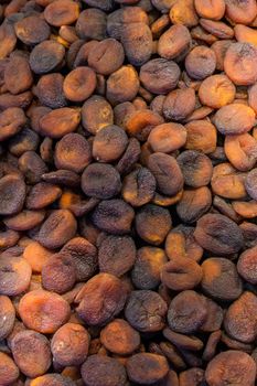 Dried apricot fruit as a background texture