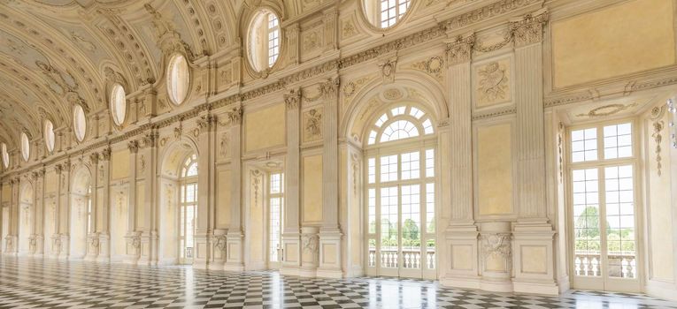 Corridor with floor made of luxury marbles. Plenty of elegance for this Italian interior in Venaria Reale, Piedmont region - Italy