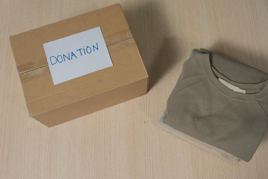 clothes in box for concept donation and reuse recycle