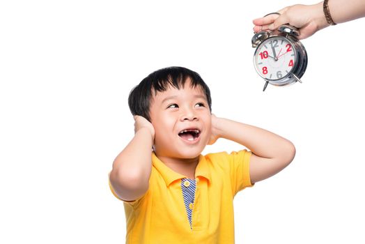 Shocked pupil with big alarm clock giving from his mom.