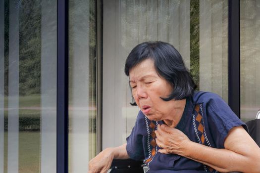 elderly woman cough ,choke