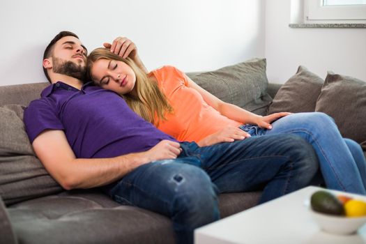 Couple enjoys napping together