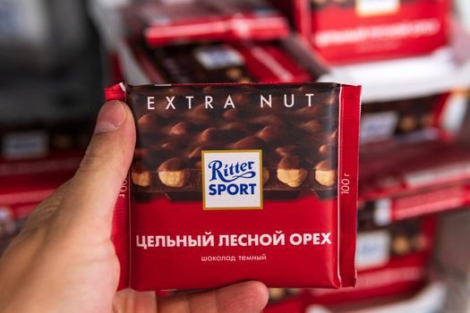 Tyumen, Russia-june 08, 2021: Chocolate on the shelves of a hypermarket. Ritter Sport is German chocolate brand founded in 1912.