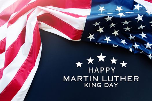 Martin Luther King Day Anniversary - American flag on blue background