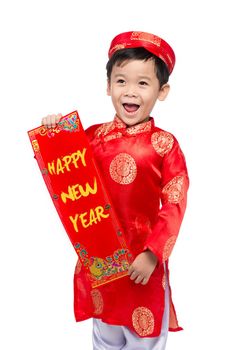 Vietnamese Boy Kid congratulating with his New Year. Happy Lunar New Year.