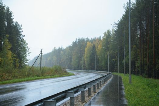 A road section with a pedestrian path located along it