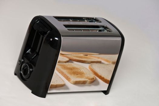 Conceptual image of toaster with bread