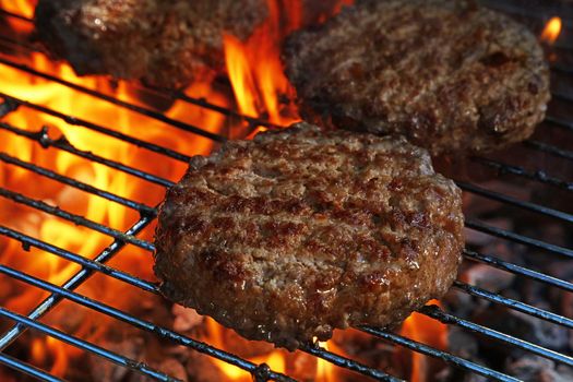 Beef burger for hamburger on barbecue flame grill