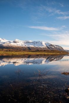 Vertical crop Icelandic mountain range with beautiful snowcapped mountains