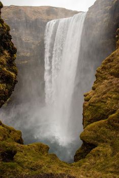 Skogafoss waterfall from the top in Iceland misty
