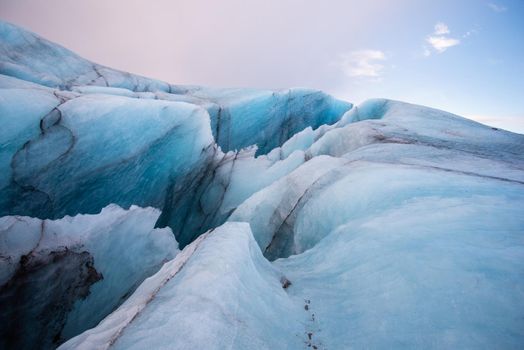 Icelandic glacier with volcanic ash close up sharp edges