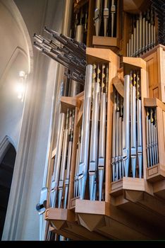 Large organs inside of a church music catholic religion
