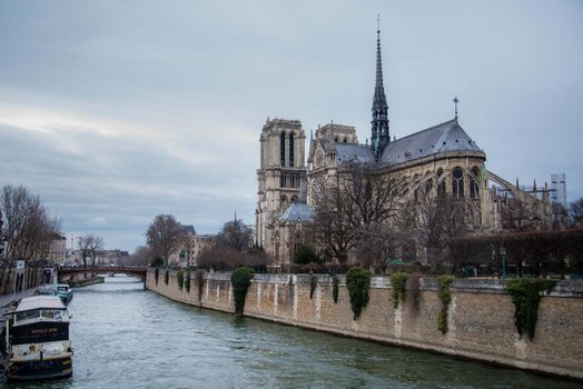 View of River Siene with Notre Dame de Paris across the way. Unique perspective