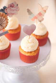 Yummy cupcakes. Valentine sweet love cupcake on table on light background