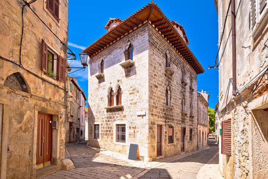 Town of Vodnjan historic stone street and architecture view