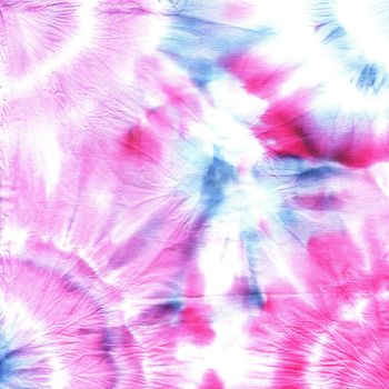 Tie dyed pattern on cotton fabric for background.