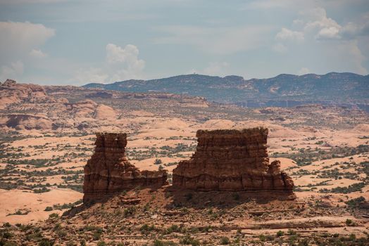 Utah mesas with mountains in background at Arches National Park