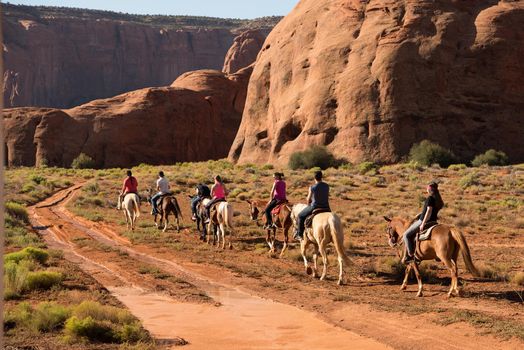Monument Valley Utah Horse back riding cowbows and mesas