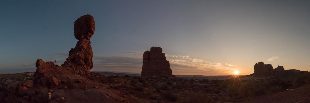 Utah Panorama of balanced rock and mesa rock at sunset