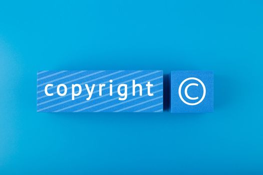 Minimal copyright protection concept on blue background