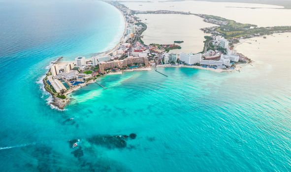 Aerial panoramic view of Cancun beach and hotel zone in Mexico. Caribbean coast landscape of Mexican resort. Riviera Maya in Quintana roo region on Yucatan Peninsula