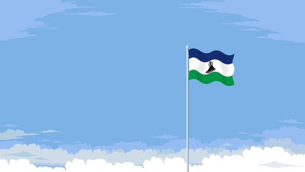 Flying flag of Lesotho in front of a cloudy sky background.