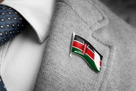 Metal badge with the flag of Kenya on a suit lapel