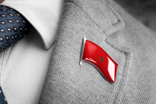Metal badge with the flag of Morocco on a suit lapel