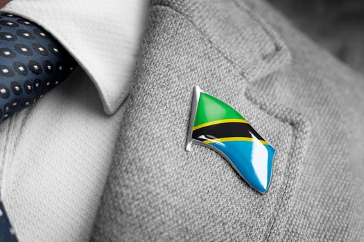 Metal badge with the flag of Tanzania on a suit lapel