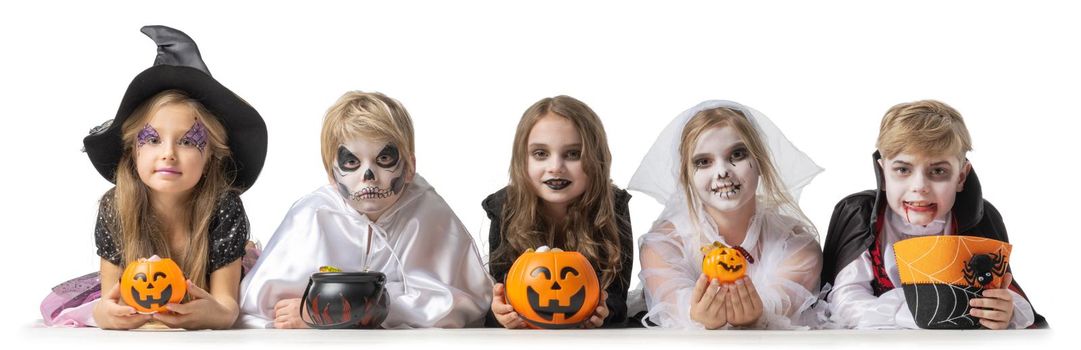 Children in Halloween costume on white