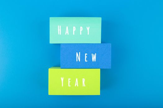 Happy New Year minimal creative concept on blue background