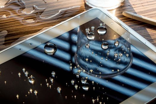 Water spilled onto the tablet, Drops of water on tablet screen