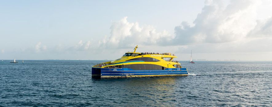 Cancun, Mexico - September 13, 2021: Ultramar ferry traveling with tourists from Cancun to Isla Mujeres