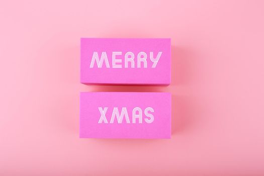 Trendy pink Merry Xmas minimal concept in light colors