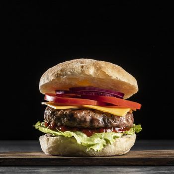 front view burger with veggies meat. High quality beautiful photo concept