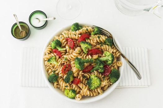 fusilli pasta salad with tomato broccoli napkin 2. High quality beautiful photo concept