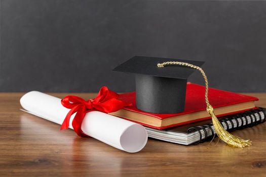 education day arrangement with graduation cap. High resolution photo