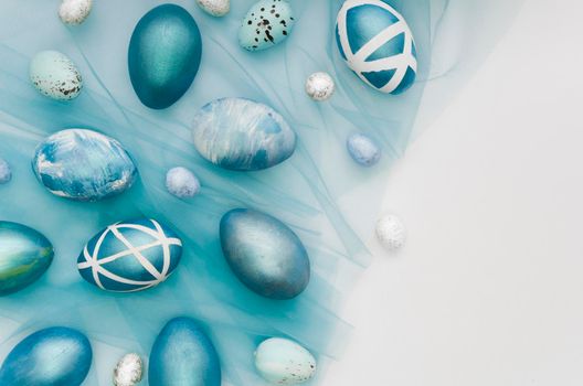 flat lay painted easter eggs with copy space