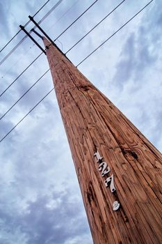 Telephone pole communications with dark clouds