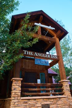 The Angler Inn hotel log cabin in the mountains