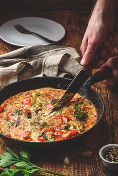 Frittata with broccoli, red bell pepper and red onion