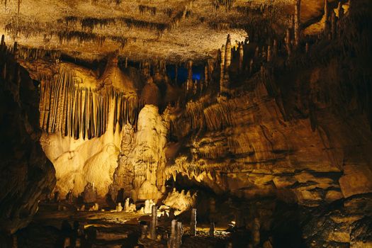 Large mammoth cave with stalagmites and stalactites