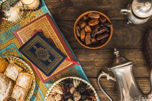 arabic desserts near books. High quality beautiful photo concept