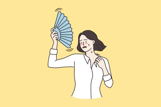 Unwell woman wave with hand fan suffer from hot weather