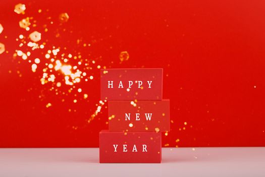 Happy New Year 2022 red elegant minimal concept on red background with bokeh