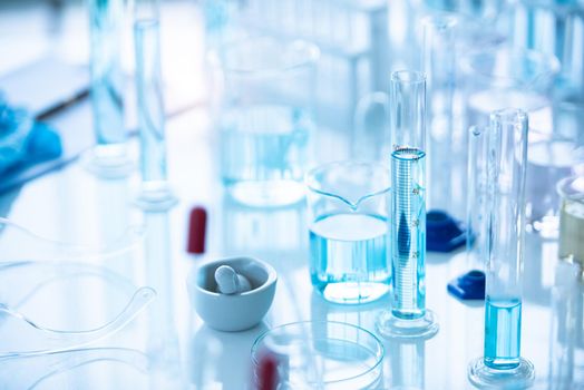 Medical laboratory test tube in chemistry biology lab test. Scientific research and development and healthcare concept background